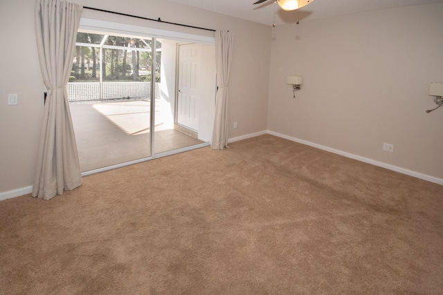 unfurnished bedroom featuring access to outside, ceiling fan, and carpet