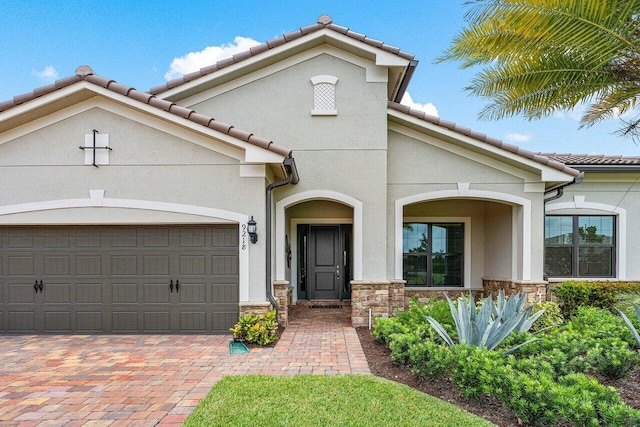 view of front of property with a garage