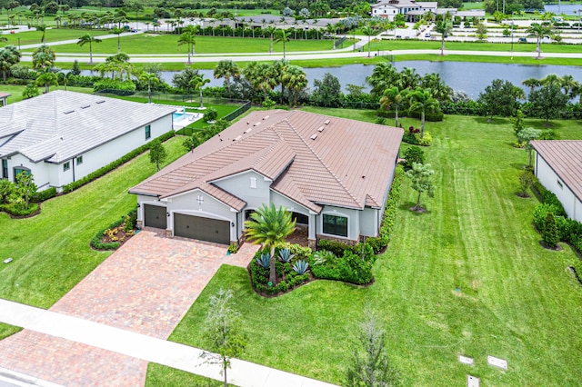 drone / aerial view with a water view