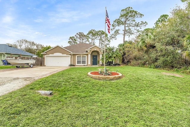 view of front of property featuring a garage and a front lawn