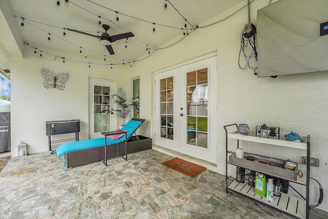 view of patio / terrace featuring french doors and ceiling fan