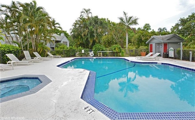 view of swimming pool featuring a patio area