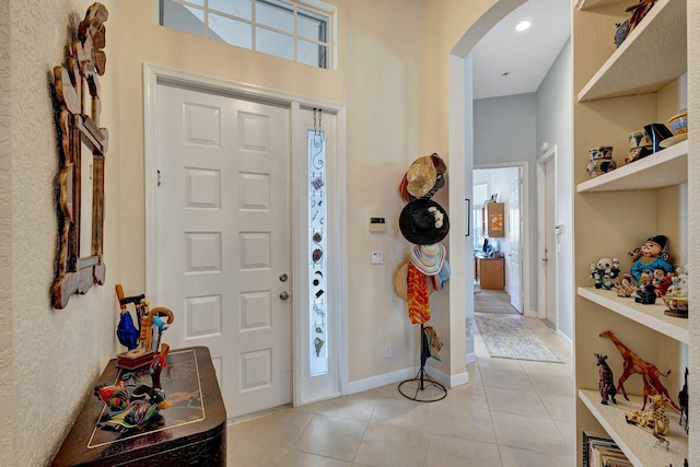 view of tiled foyer entrance