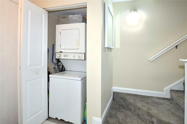 laundry room with stacked washer and dryer and carpet floors