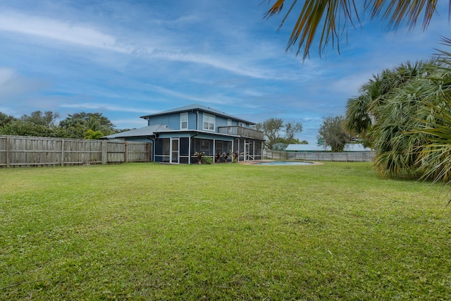 view of yard with a sunroom