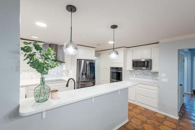 kitchen with appliances with stainless steel finishes, decorative light fixtures, decorative backsplash, and white cabinets