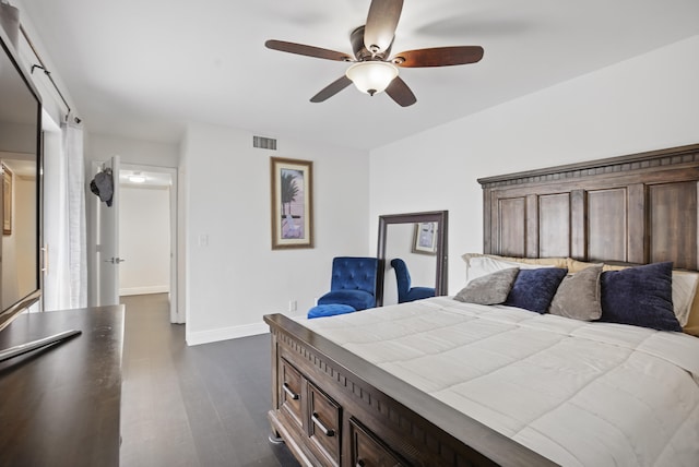 bedroom featuring dark wood-type flooring and ceiling fan