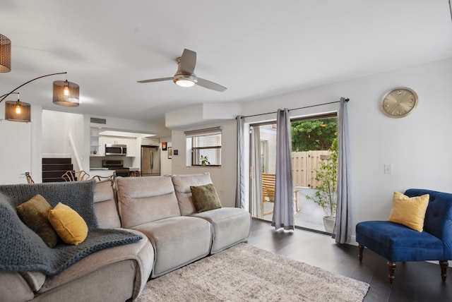 living room with ceiling fan