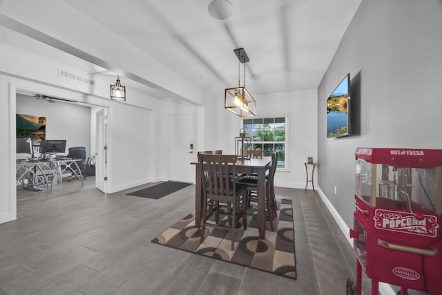 1316 SW Abacus Ave, Port Saint Lucie, FL 34953 - dining room featuring wood finished floors, baseboards, and a desk