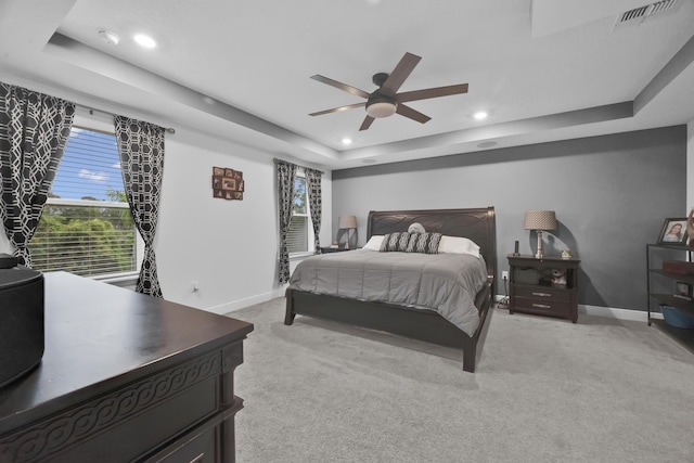 1316 SW Abacus Ave, Port Saint Lucie, FL 34953 - bedroom featuring a tray ceiling, baseboards, light colored carpet, recessed lighting, and ceiling fan