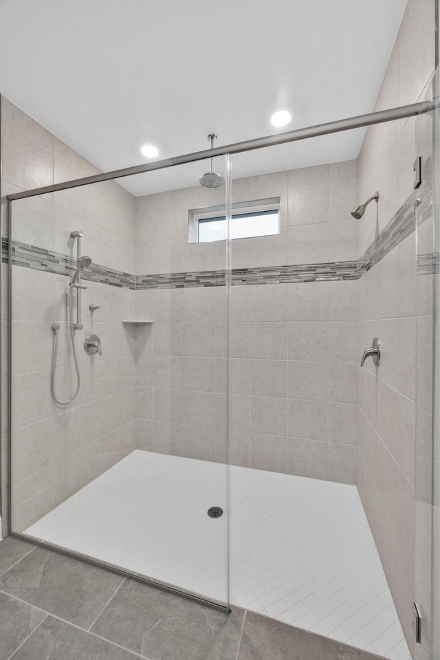 1316 SW Abacus Ave, Port Saint Lucie, FL 34953 - bathroom with a stall shower, tile patterned floors, and recessed lighting