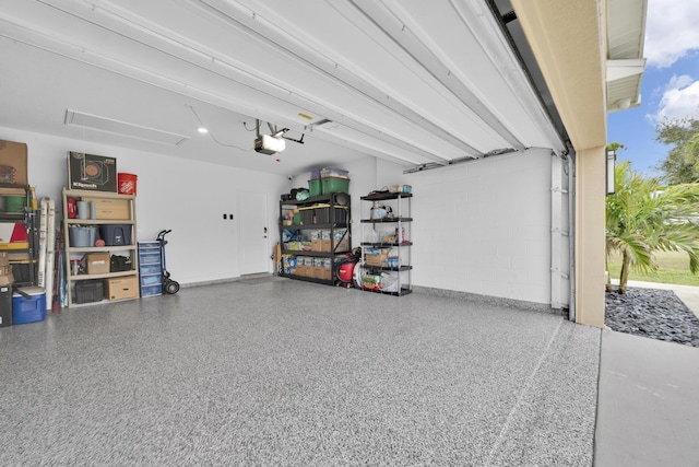 1316 SW Abacus Ave, Port Saint Lucie, FL 34953 - garage with a garage door opener