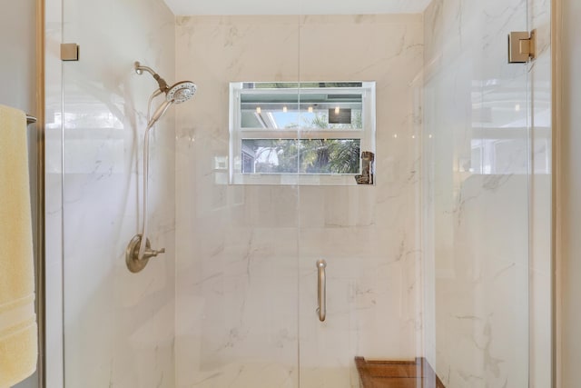 bathroom featuring an enclosed shower