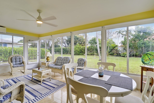 sunroom / solarium featuring ceiling fan and an AC wall unit