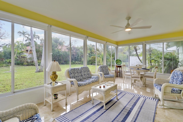 sunroom with ceiling fan