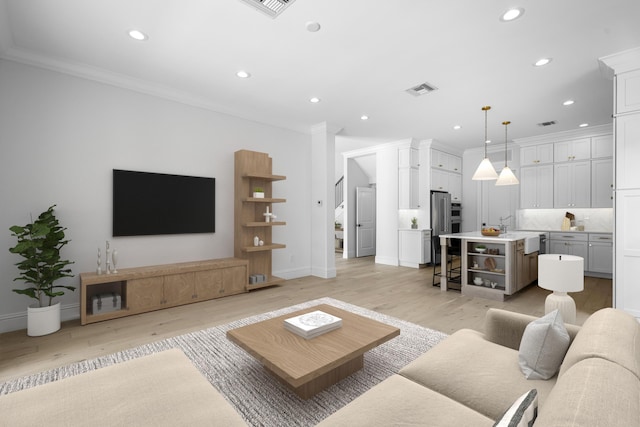 living room with crown molding and light wood-type flooring