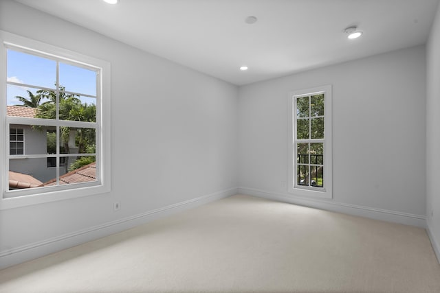 empty room featuring carpet flooring