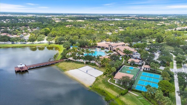 birds eye view of property with a water view