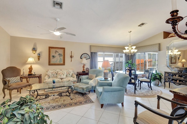 living room featuring light tile patterned floors, vaulted ceiling, ceiling fan with notable chandelier, and visible vents