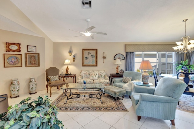 living room with ceiling fan with notable chandelier, visible vents, vaulted ceiling, and light tile patterned floors