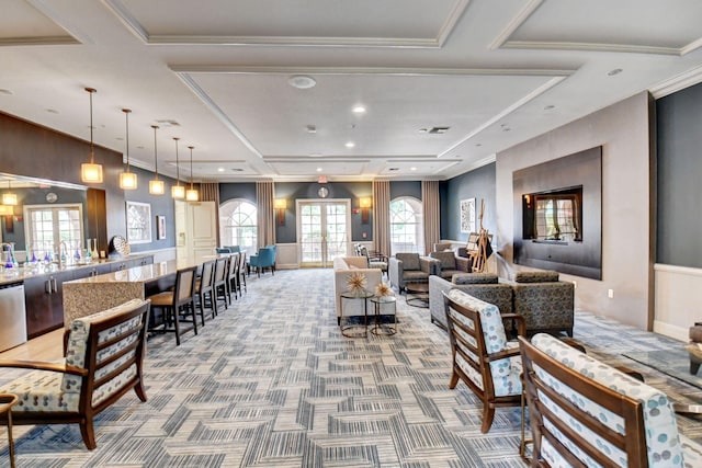 carpeted living room with french doors, ornamental molding, visible vents, and recessed lighting