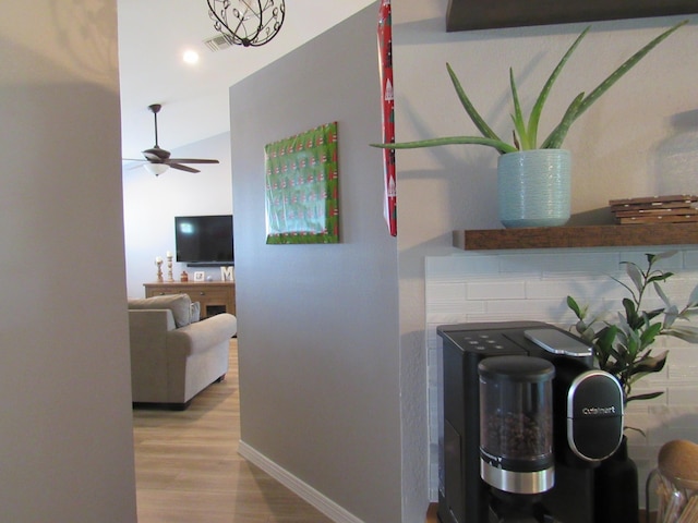 hall with light hardwood / wood-style flooring