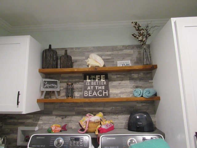 details featuring crown molding and white cabinets