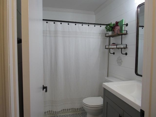 bathroom featuring ornamental molding, walk in shower, vanity, and toilet