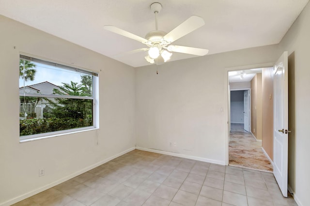 unfurnished room featuring ceiling fan