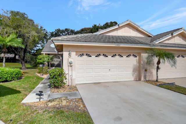 view of side of property with a garage