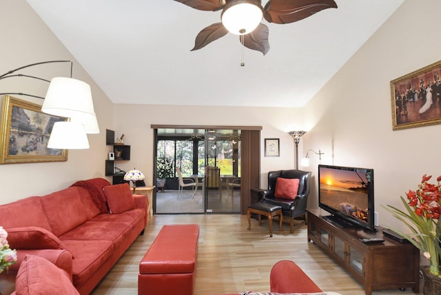 living room featuring hardwood / wood-style flooring and ceiling fan