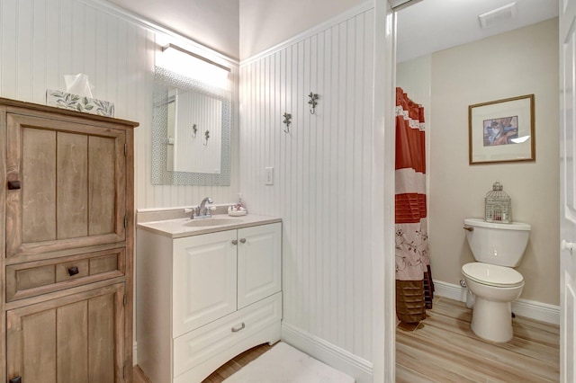 bathroom featuring vanity, a shower with curtain, wood-type flooring, and toilet