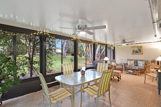 sunroom with plenty of natural light and ceiling fan