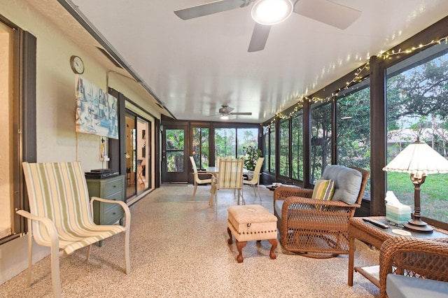 sunroom / solarium with ceiling fan