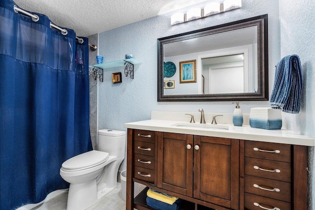 bathroom featuring vanity, a shower with shower curtain, a textured ceiling, and toilet