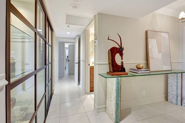 hallway featuring light tile patterned floors