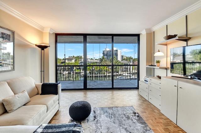 living room with light parquet floors, crown molding, and a wall of windows