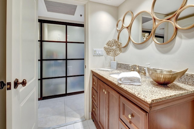 bathroom featuring vanity and tile patterned floors