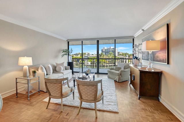 living room featuring crown molding, light parquet flooring, and expansive windows