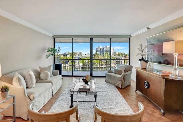 living room with light parquet flooring, floor to ceiling windows, and crown molding