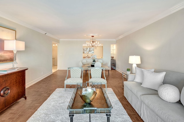 living room with ornamental molding, parquet flooring, and an inviting chandelier