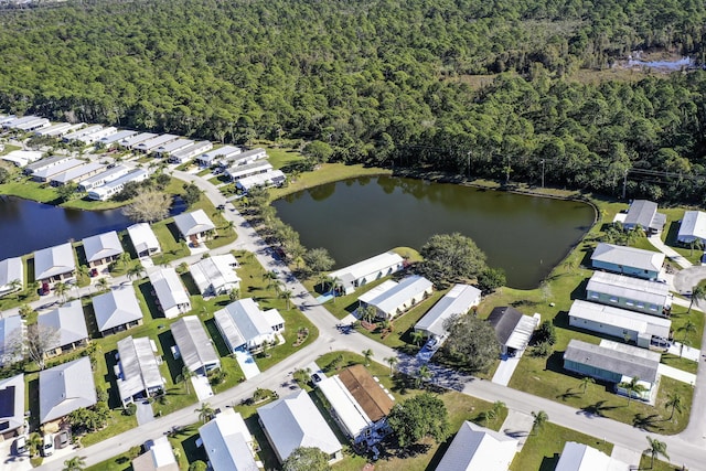 aerial view with a residential view and a water view