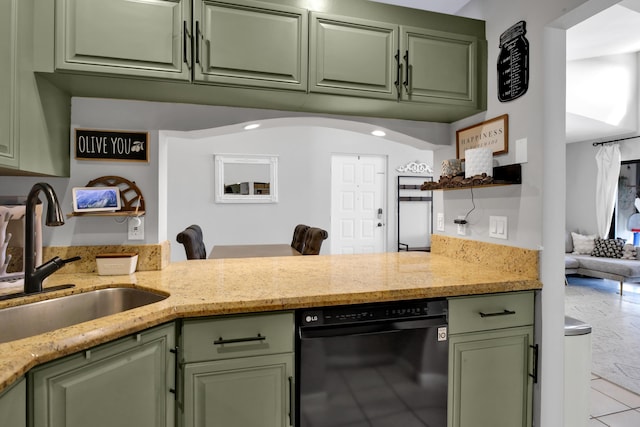 kitchen with sink, dishwasher, green cabinets, light stone counters, and kitchen peninsula