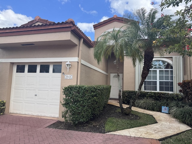 view of front of house with a garage