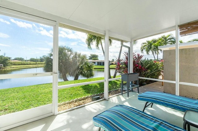 sunroom with a water view