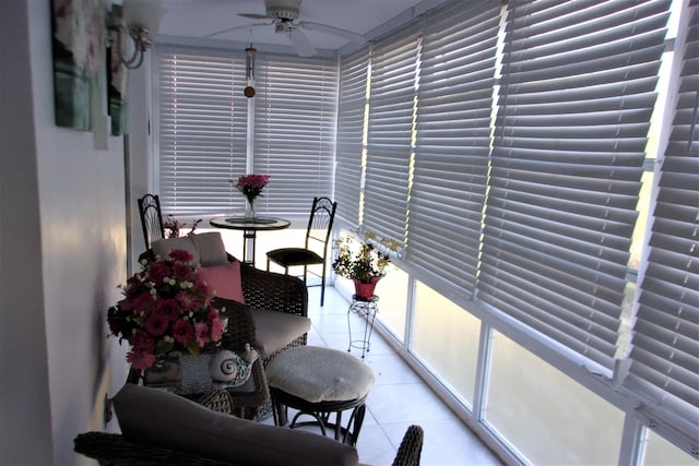 sunroom / solarium with ceiling fan