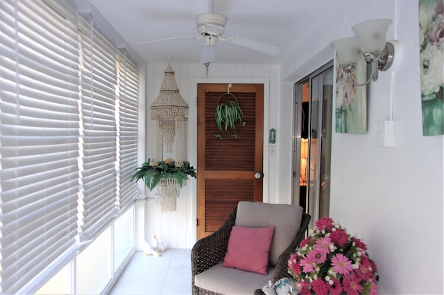 entrance to property with ceiling fan