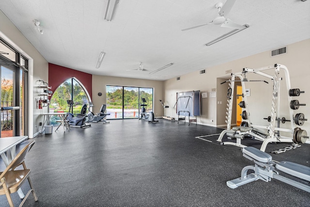 gym with ceiling fan