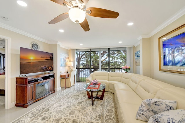 living room with crown molding, floor to ceiling windows, and ceiling fan