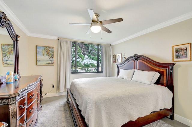 carpeted bedroom featuring crown molding and ceiling fan